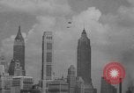 Image of Marilyn Rich stunt on rings New York City USA, 1951, second 27 stock footage video 65675071433