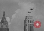 Image of Marilyn Rich stunt on rings New York City USA, 1951, second 30 stock footage video 65675071433