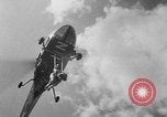 Image of Marilyn Rich stunt on rings New York City USA, 1951, second 32 stock footage video 65675071433