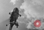 Image of Marilyn Rich stunt on rings New York City USA, 1951, second 36 stock footage video 65675071433