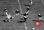 Standbild American Football Match Atlanta Georgia USA, 1955, aus Sekunde 26 historischem Filmmaterial Videoclip 65675071441