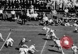 Standbild American Football Match Atlanta Georgia USA, 1955, aus Sekunde 56 historischem Filmmaterial Videoclip 65675071441