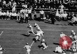 Standbild American Football Match Atlanta Georgia USA, 1955, aus Sekunde 57 historischem Filmmaterial Videoclip 65675071441