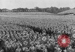 Image of Adolf Hitler in Nazi rally at Zeppelin Field in Nuremberg Germany, 1933, second 3 stock footage video 65675071551