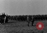 Image of German troops marching on a rough field Germany, 1933, second 3 stock footage video 65675071553