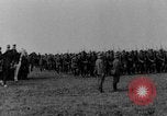 Image of German troops marching on a rough field Germany, 1933, second 6 stock footage video 65675071553