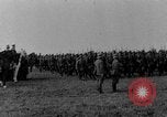Image of German troops marching on a rough field Germany, 1933, second 7 stock footage video 65675071553