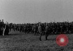 Image of German troops marching on a rough field Germany, 1933, second 8 stock footage video 65675071553