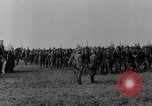 Image of German troops marching on a rough field Germany, 1933, second 9 stock footage video 65675071553