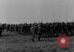 Image of German troops marching on a rough field Germany, 1933, second 10 stock footage video 65675071553