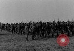 Image of German troops marching on a rough field Germany, 1933, second 11 stock footage video 65675071553