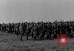 Image of German troops marching on a rough field Germany, 1933, second 12 stock footage video 65675071553