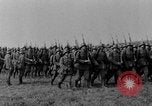 Image of German troops marching on a rough field Germany, 1933, second 14 stock footage video 65675071553