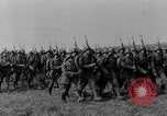 Image of German troops marching on a rough field Germany, 1933, second 15 stock footage video 65675071553