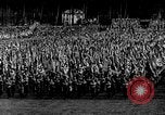 Image of German troops marching on a rough field Germany, 1933, second 16 stock footage video 65675071553