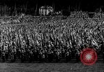 Image of German troops marching on a rough field Germany, 1933, second 17 stock footage video 65675071553