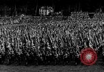 Image of German troops marching on a rough field Germany, 1933, second 19 stock footage video 65675071553