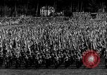 Image of German troops marching on a rough field Germany, 1933, second 20 stock footage video 65675071553