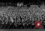 Image of German troops marching on a rough field Germany, 1933, second 21 stock footage video 65675071553