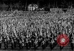 Image of German troops marching on a rough field Germany, 1933, second 24 stock footage video 65675071553