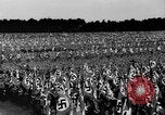 Image of German troops marching on a rough field Germany, 1933, second 39 stock footage video 65675071553