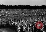 Image of German troops marching on a rough field Germany, 1933, second 40 stock footage video 65675071553