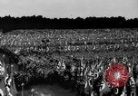 Image of German troops marching on a rough field Germany, 1933, second 42 stock footage video 65675071553
