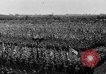 Image of German troops marching on a rough field Germany, 1933, second 43 stock footage video 65675071553