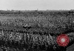 Image of German troops marching on a rough field Germany, 1933, second 44 stock footage video 65675071553