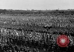 Image of German troops marching on a rough field Germany, 1933, second 47 stock footage video 65675071553