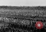 Image of German troops marching on a rough field Germany, 1933, second 48 stock footage video 65675071553