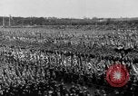 Image of German troops marching on a rough field Germany, 1933, second 49 stock footage video 65675071553