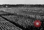 Image of German troops marching on a rough field Germany, 1933, second 52 stock footage video 65675071553