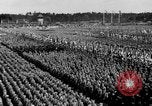 Image of German troops marching on a rough field Germany, 1933, second 53 stock footage video 65675071553
