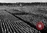 Image of German troops marching on a rough field Germany, 1933, second 54 stock footage video 65675071553
