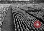 Image of German troops marching on a rough field Germany, 1933, second 56 stock footage video 65675071553
