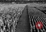 Image of German troops marching on a rough field Germany, 1933, second 58 stock footage video 65675071553