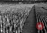 Image of German troops marching on a rough field Germany, 1933, second 59 stock footage video 65675071553