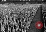 Image of German troops marching on a rough field Germany, 1933, second 60 stock footage video 65675071553