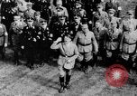 Image of German troops marching on a rough field Germany, 1933, second 61 stock footage video 65675071553