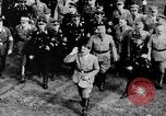 Image of German troops marching on a rough field Germany, 1933, second 62 stock footage video 65675071553