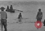 Image of Native fishermen Hawaii USA, 1916, second 4 stock footage video 65675071578