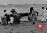 Image of Native fishermen Hawaii USA, 1916, second 34 stock footage video 65675071578