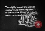 Image of Steam driven hammer forges hot steel billets into Studebaker engine parts South Bend Indiana USA, 1920, second 1 stock footage video 65675071728