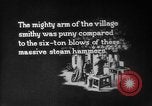 Image of Steam driven hammer forges hot steel billets into Studebaker engine parts South Bend Indiana USA, 1920, second 3 stock footage video 65675071728