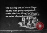 Image of Steam driven hammer forges hot steel billets into Studebaker engine parts South Bend Indiana USA, 1920, second 14 stock footage video 65675071728