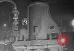 Image of Steam driven hammer forges hot steel billets into Studebaker engine parts South Bend Indiana USA, 1920, second 16 stock footage video 65675071728