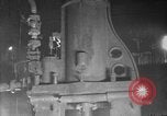 Image of Steam driven hammer forges hot steel billets into Studebaker engine parts South Bend Indiana USA, 1920, second 17 stock footage video 65675071728