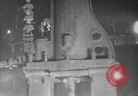 Image of Steam driven hammer forges hot steel billets into Studebaker engine parts South Bend Indiana USA, 1920, second 18 stock footage video 65675071728
