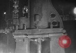 Image of Steam driven hammer forges hot steel billets into Studebaker engine parts South Bend Indiana USA, 1920, second 19 stock footage video 65675071728
